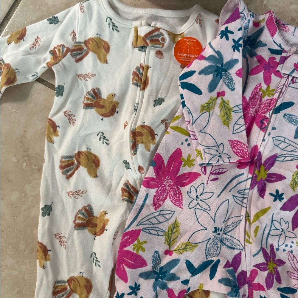 Brand new Carter’s long sleeve footed pjs
